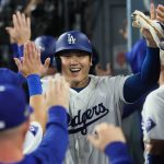 Shohei Ohtani of the Los Angeles Dodgers celebrates after scoring on a two-run single by Teoscar Hernandez during the fourth inning in the N.L. Division Series against the San Diego Padres at Dodger Stadium on Saturday, Oct. 5, 2024, in Los Angeles. (Robert Gauthier / Los Angeles Times / Tribune News Services)