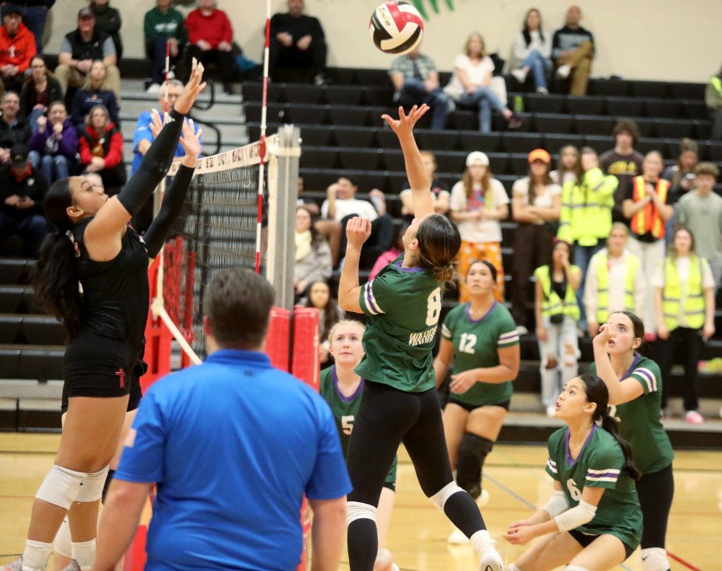 Edmonds-Woodway junior outside hitter Ava Bartin tips the ball over the net in a Wesco 3A/2A South matchup against Archbishop Murphy in Everett, Wash., on Oct. 9, 2024. The unranked Wildcats won 3-1 and handed the No. 10 Warriors their first loss of the season. (Taras McCurdie / The Herald)