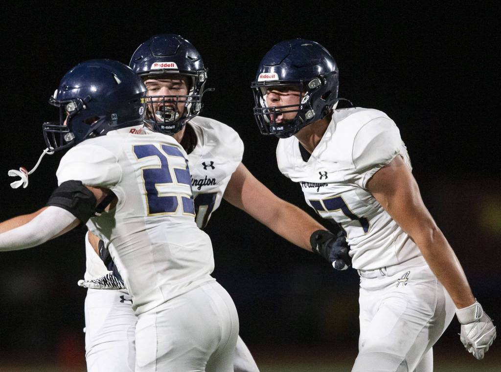 Arlingtons Levi Reid reacts to his tackle during the Stilly Cup game against Stanwood on Friday, Oct. 11, 2024 in Stanwood, Washington. (Olivia Vanni / The Herald)