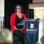 Everett Mayor Cassie Franklin steps back and takes in a standing ovation after delivering the State of the City Address on March 21 at the Everett Mall. (Ryan Berry / The Herald)