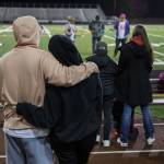 Community members, family and friends of those lost in the Marysville Pilchuck High School shooting listen to a song to conclude the memorial on Thursday, Oct. 24, 2024 in Marysville, Washington. (Olivia Vanni / The Herald)
