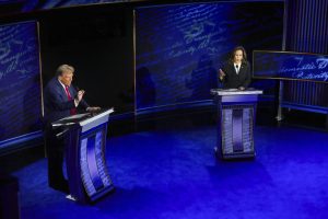 FILE — Former President Donald Trump and Vice President Kamala Harris speak over each other during the presidential debate at the National Constitution Center in Philadelphia, Sept. 10, 2024. Trump repeatedly spread falsehoods about immigrants in Springfield, Ohio, during the presidential debate, and a flood of threats to Jamie McGregor, CEO of McGregor Metal Co., his family, and his business followed. (Doug Mills/The New York Times)