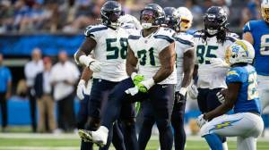 Seahawks defensive tackle Byron Murphy reacts after a play against the Los Angeles Chargers at SoFi Stadium on Aug. 10, 2024 (Photo courtesy of the Seattle Seahawks)