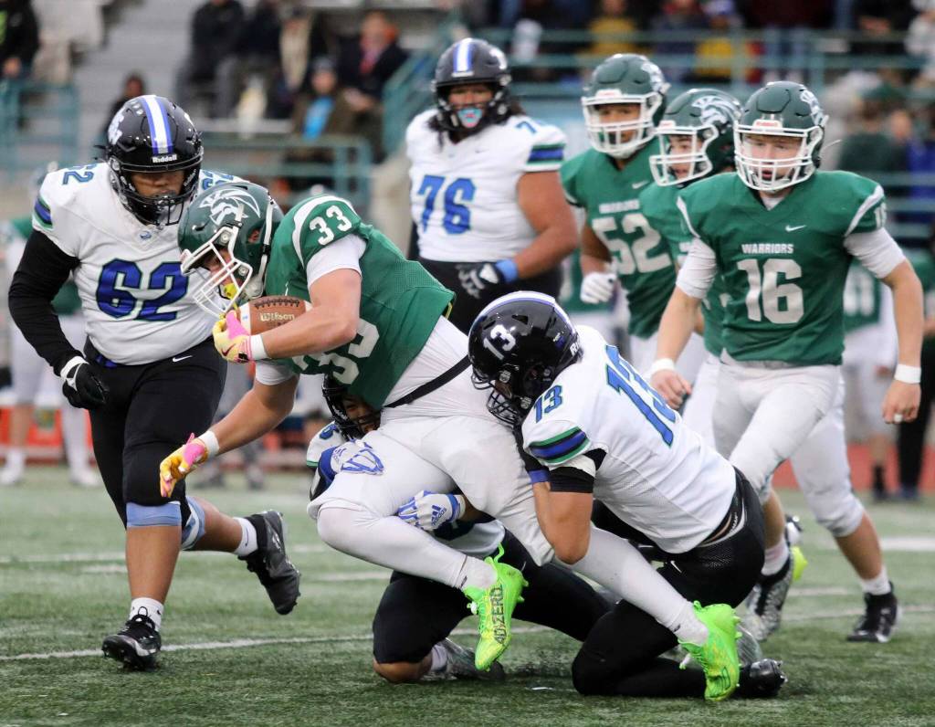 Edmonds-Woodway junior running back Carmelo LaRocca gets tackled during a Wesco 3A South matchup against Shorewood in Edmonds, Wash., on Oct. 18, 2024. Shorewood won 31-13. (Taras McCurdie / The Herald)