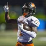 Marysville Pilchuck’s Christian Van Natta lifts the ball in the air to celebrate a turnover during the game against Marysville Getchell on Friday, Sept. 16, 2022 in Marysville, Washington. (Olivia Vanni / The Herald)