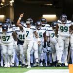 Quarterback Geno Smith (7) leads the Seahawks on to the field prior to a game against the Atlanta Falcons at Mercedez-Benz Stadium on Sunday, Oct. 20, 2024. (Photo courtesty of Rod Mar / Seattle Seahawks)