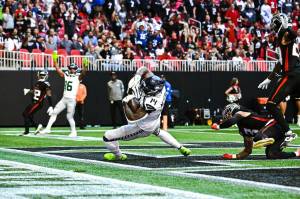 Seahawks wide receiver DK Metcalf catches a touchdown against the Atlanta Falcons at Mercedes-Benz Stadium on Sunday, Oct. 20, 2024. (Photo courtesy of Edwin Hooper / Seattle Seahawks)