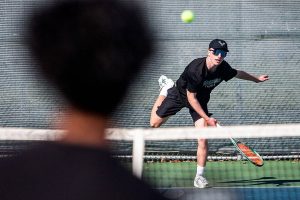 Andy Stark serves the ball during the district championship doubles match on Thursday, Oct. 24, 2024 in Snohomish, Washington. (Olivia Vanni / The Herald)