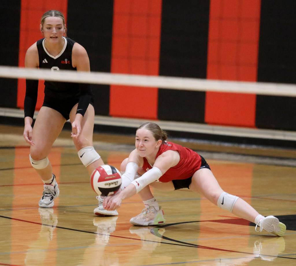 Archbishop Murphy senior libero Audrey Russell gets to the ball in a Wesco 3A/2A South matchup against Edmonds-Woodway in Everett, Wash., on Oct. 9, 2024. The unranked Wildcats won 3-1 and handed the No. 10 Warriors their first loss of the season. (Taras McCurdie / The Herald)