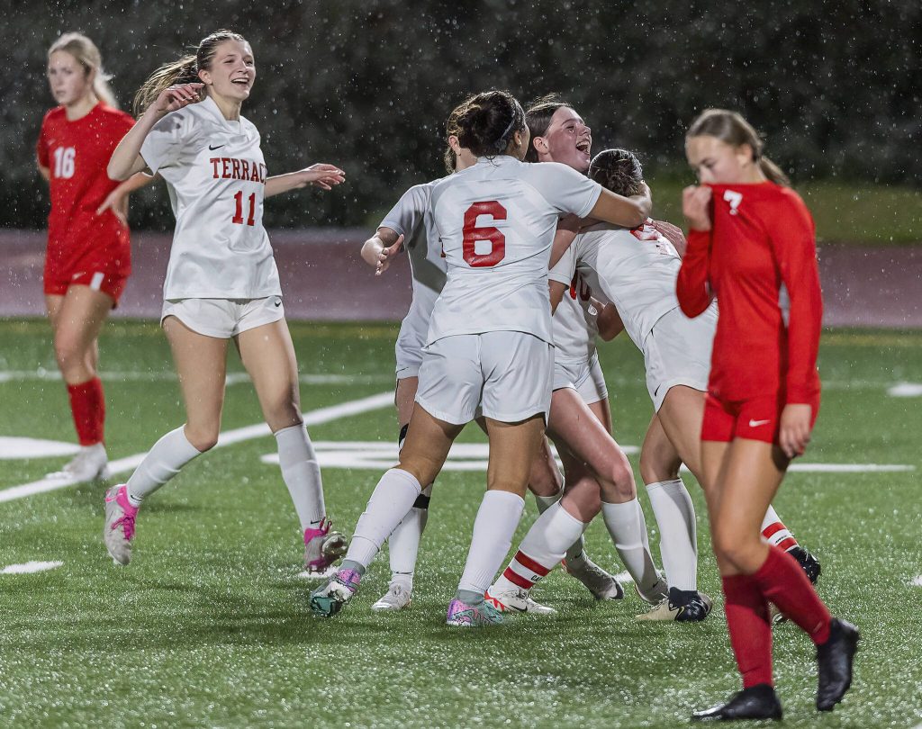 Mountlake Terrace player celebrate scoring a second goal during the 3A district game against Stanwood on Thursday, Oct. 31, 2024 in Stanwood, Washington. (Olivia Vanni / The Herald)