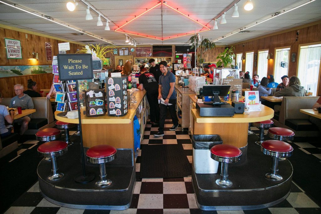 Servers zoom around while slinging breakfast and coffee at Twedes Cafe on Sunday, June 9, 2024, in North Bend, Washington. (Ryan Berry / The Herald)