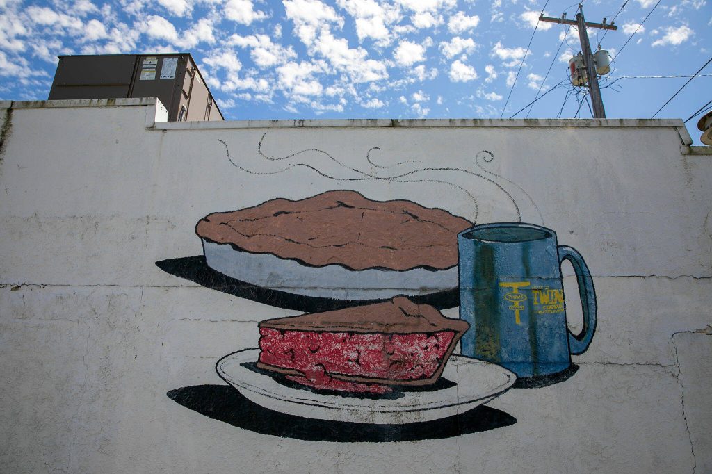 A mural of pie and coffee decorates the exterior of Twedes Cafe on Sunday, June 9, 2024, in North Bend, Washington. (Ryan Berry / The Herald)
