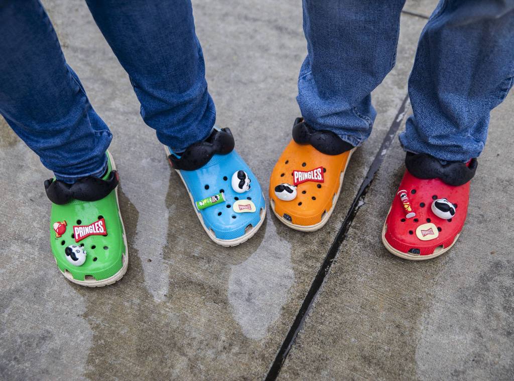 People wear Pringles themed Crocs on Friday, Nov. 1, 2024 in Everett, Washington. (Olivia Vanni / The Herald)