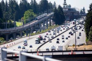 A Link light rail train moves northbound toward the Shoreline South station on Wednesday, Aug. 28, 2024 in Shoreline, Washington. (Olivia Vanni / The Herald)
