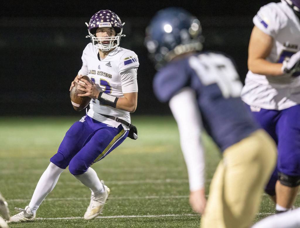 Lake Stevens Kolton Matson looks for a teammate to pass to during the game against Arlington on Friday, Nov. 1, 2024 in Arlington, Washington. (Olivia Vanni / The Herald)