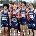 Members of the Meadowdale High School boys cross country team pose for a photo at the District 1/2 Cross Country Championships at Lakewood High School in Arlington, Wash., on Nov. 2, 2024. The Mavericks finished second in 3A. (Taras McCurdie / The Herald)