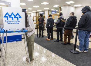 Nora Xue, 24, fills out her ballot at the Snohomish County Auditors Office on Tuesday, Nov. 5, 2024 in Everett, Washington. (Olivia Vanni / The Herald)