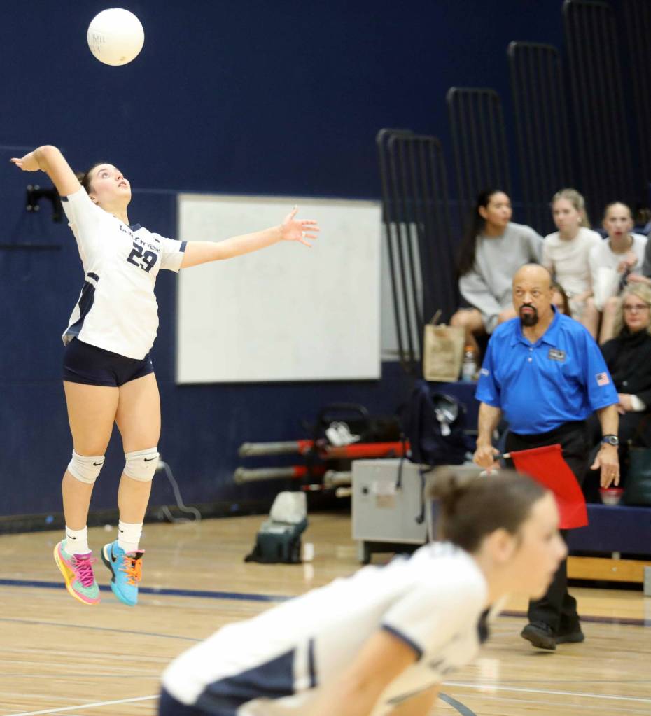 Glacier Peak senior defensive setter/outside hitter Estefania Guerrero serves the ball during the Wesco 4A title game against Lake Stevens in Snohomish, Wash., on Monday, Nov. 4, 2024. The Vikings won in four sets, 3-1. (Taras McCurdie / The Herald)