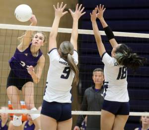 Lake Stevens junior outside hitter Laura Eichert hits the ball over the net for a kill in the Wesco 4A title game against Glacier Peak in Snohomish, Wash., on Monday, Nov. 4, 2024. The Vikings won in four sets, 3-1. (Taras McCurdie / The Herald)
