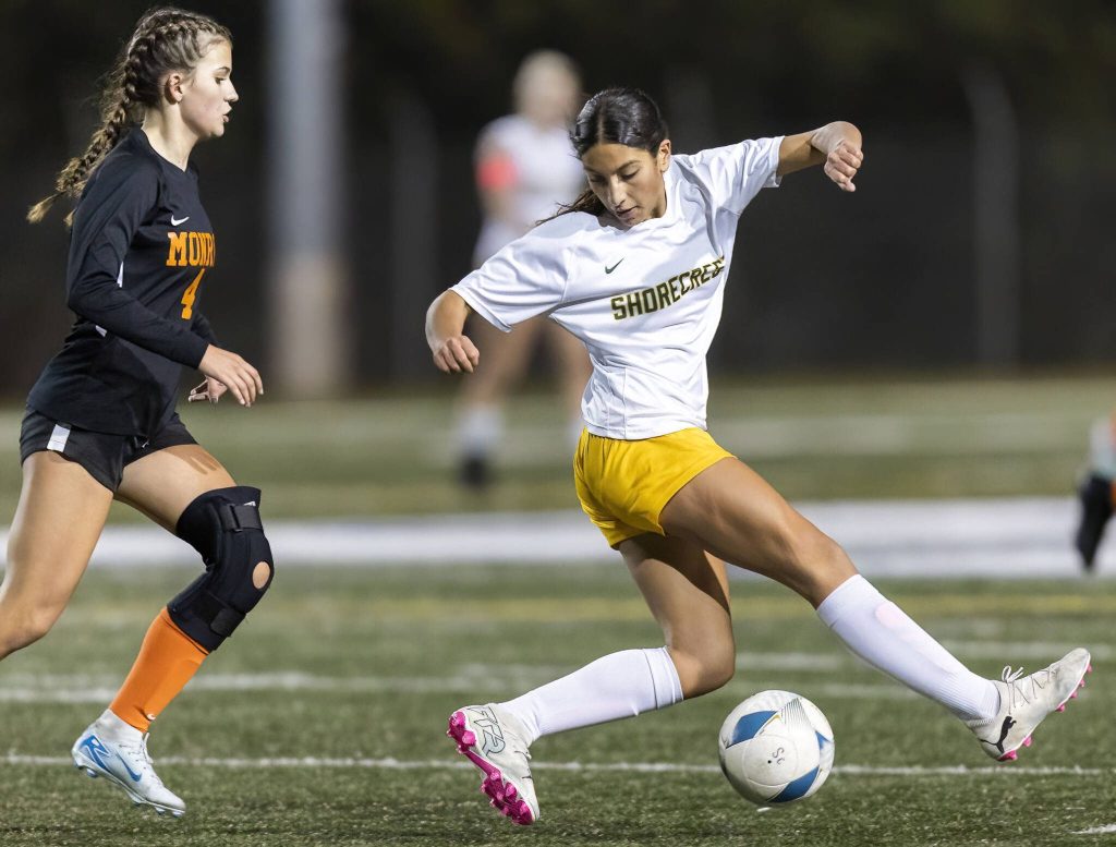 Shorecrests Nada Faraj does a crossover move to get around Monroes Paige Underwood during the 3A district game on Thursday, Nov. 7, 2024 in Shoreline, Washington. (Olivia Vanni / The Herald)