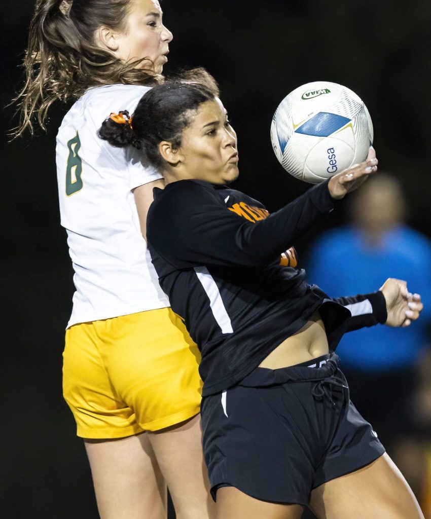 Monroes Addison Williams traps the ball with her chest during the 3A district game against Shorecrest on Thursday, Nov. 7, 2024 in Shoreline, Washington. (Olivia Vanni / The Herald)