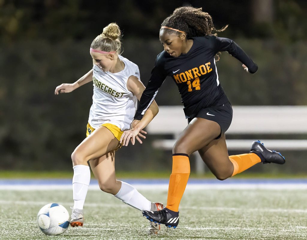 Shorecrests Pip Watkinson breaks away from Monroes Halle Keller during the 3A district game on Thursday, Nov. 7, 2024 in Shoreline, Washington. (Olivia Vanni / The Herald)