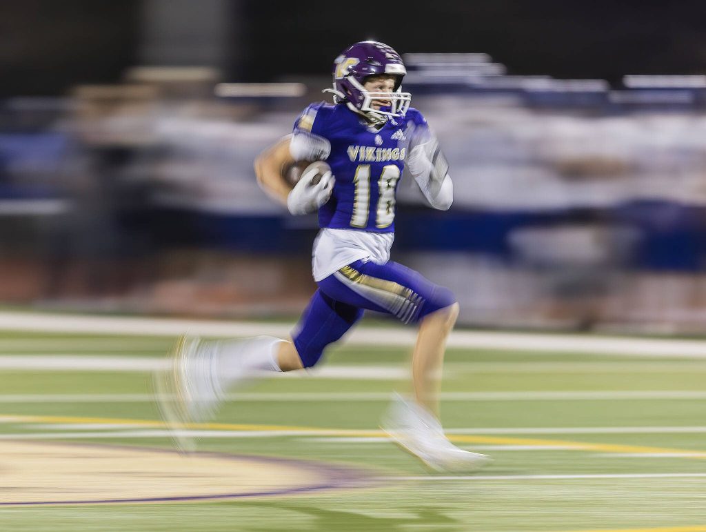Lake Stevens Max Cook runs down the open field during a punt return to end zone for a touchdown during the 4A district game against Tahoma on Friday, Nov. 8, 2024 in Lake Stevens, Washington. (Olivia Vanni / The Herald)