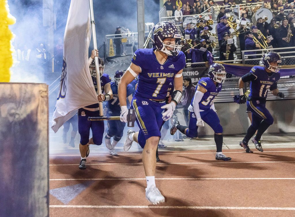 Lake Stevens Keagan Howard leads his team out of the locker room and onto the field before the start of the 4A district game against Tahoma on Friday, Nov. 8, 2024 in Lake Stevens, Washington. (Olivia Vanni / The Herald)