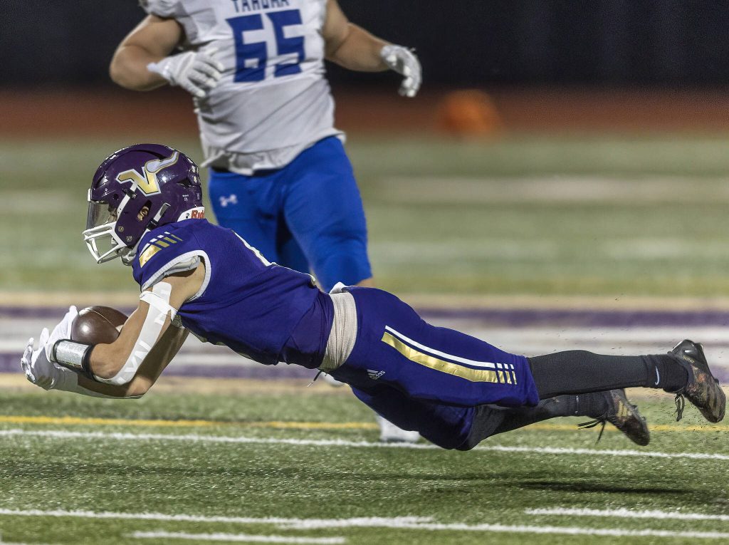 Lake Stevens Blake Moser lays out for the ball during the 4A district game against Tahoma on Friday, Nov. 8, 2024 in Lake Stevens, Washington. (Olivia Vanni / The Herald)