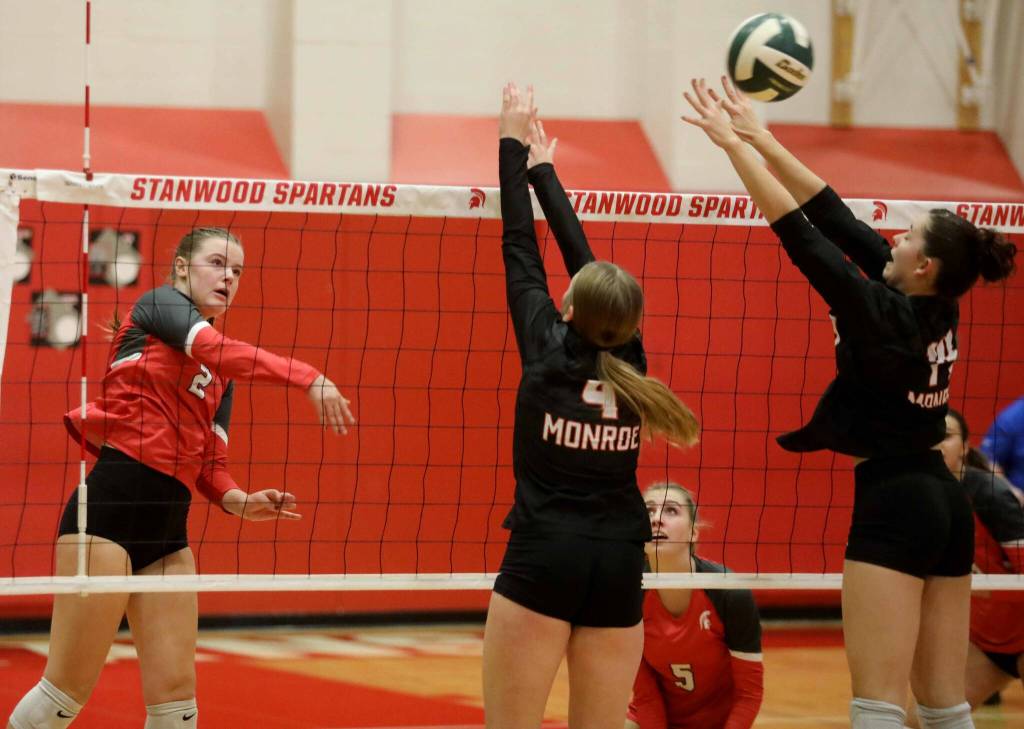 Stanwood sophomore outside hitter Harper Neyens hits the ball during a District 1 3A quarterfinals match against Monroe in Stanwood, Wash., on Tuesday, Nov. 12, 2024. The Spartans won 3-1. (Taras McCurdie / The Herald)