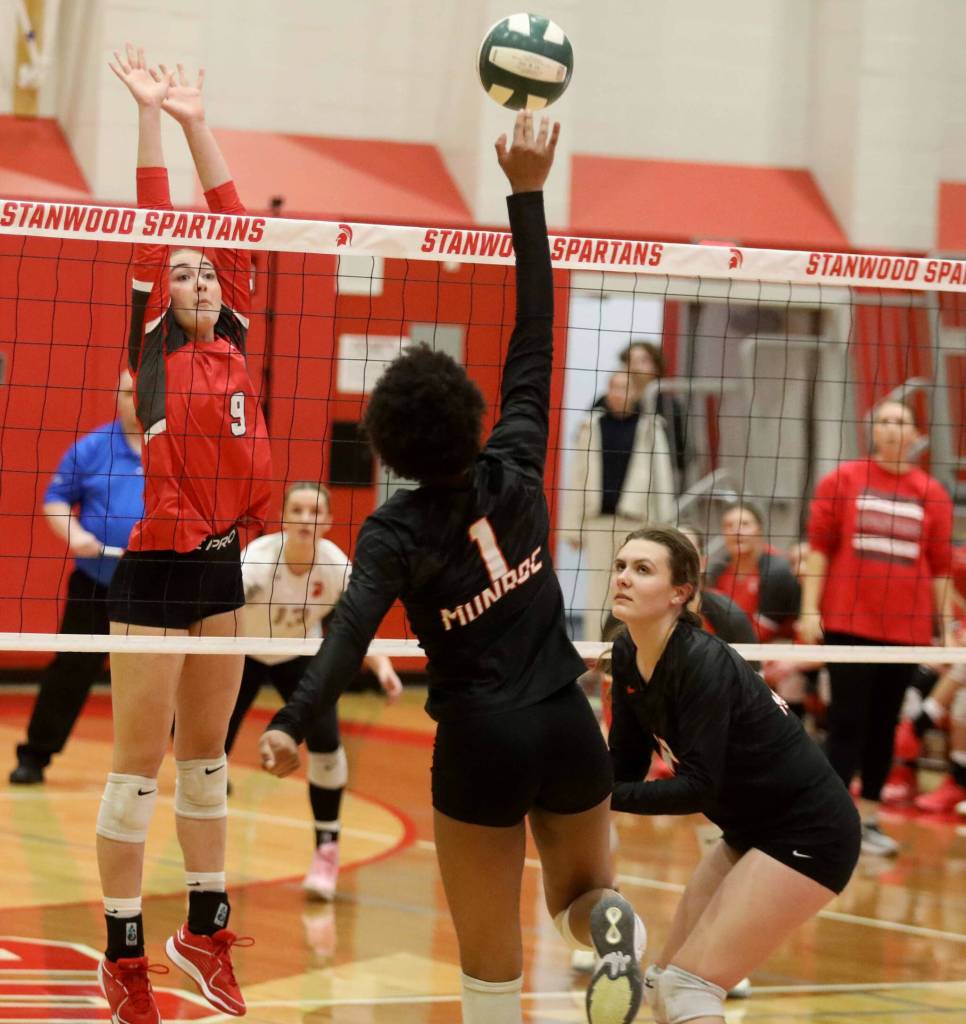 Monroe sophomore Shannara Peebles hits the ball during a District 1 3A quarterfinals match against Monroe in Stanwood, Wash., on Tuesday, Nov. 12, 2024. The Spartans won 3-1. (Taras McCurdie / The Herald)