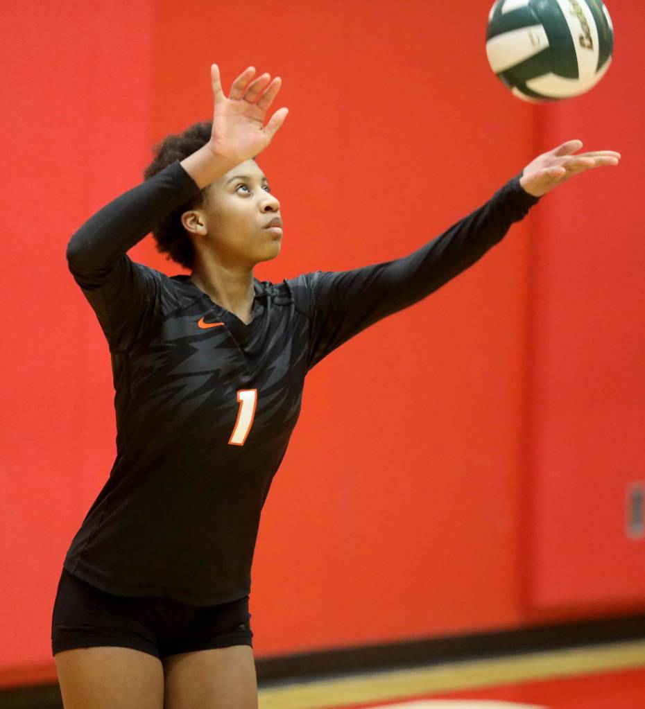 Monroe sophomore Shannara Peebles serves the ball during a District 1 3A quarterfinals match against Monroe in Stanwood, Wash., on Tuesday, Nov. 12, 2024. The Spartans won 3-1. (Taras McCurdie / The Herald)