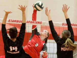 Stanwood sophomore outside hitter Harper Neyens hits the ball during a District 1 3A quarterfinals match against Monroe in Stanwood, Wash., on Tuesday, Nov. 12, 2024. The Spartans won 3-1. (Taras McCurdie / The Herald)