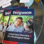 Flyers of support for Democratic gubernatorial candidate Bob Ferguson. (Laurel Demkovich / Washington State Standard)