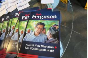 Flyers of support for Democratic gubernatorial candidate Bob Ferguson. (Laurel Demkovich / Washington State Standard)