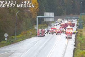 A state Department of Transportation traffic camera from Highway 527 shows the aftermath of a school bus crash Wednesday afternoon on I-405. (Photo provided by the state Department of Transportation)