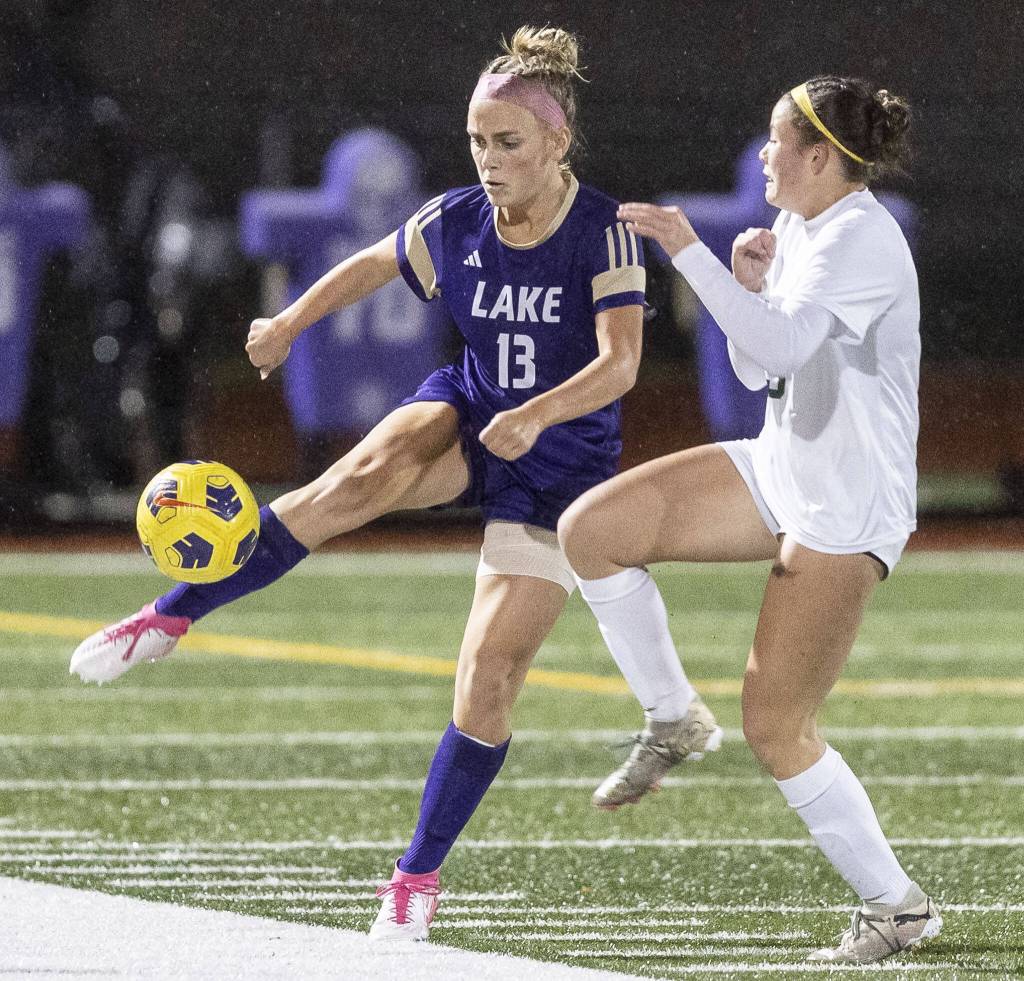 Lake Stevens Natalia Adamik half volley kicks the ball during the 4A state playoff game against Richland on Wednesday, Nov. 13, 2024 in Lake Stevens, Washington. (Olivia Vanni / The Herald)