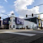 People cross Hoyt Avenue next to the Imagine Childrens Museum on Friday in Everett. (Olivia Vanni / The Herald)