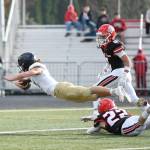 Arlington senior Chase Deberry dives into the end zone Saturday, Nov. 23, 2024, during the Eagles 35-21 loss to Camas in a quarterfinal playoff game at Doc Harris Stadium in Camas. (Taylor Balkom / The Columbian)