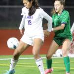 Lake Stevens sophomore forward Noelani Tupua controls the ball in the Class 4A state title game against second-seeded Woodinville at Sparks Stadium in Puyallup, Wash., on Saturday, Nov. 23, 2024. This marked the first state title in program history for the Vikings. (Taras McCurdie / The Herald)