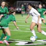Lake Stevens sophomore forward Noelani Tupua dribbles the ball in the Class 4A state title game against second-seeded Woodinville at Sparks Stadium in Puyallup, Wash., on Saturday, Nov. 23, 2024. This marked the first state title in program history for the Vikings. (Taras McCurdie / The Herald)