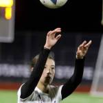 Lake Stevens sophomore midfielder Mia Ingram throws the ball into play in the Class 4A state title game against second-seeded Woodinville at Sparks Stadium in Puyallup, Wash., on Saturday, Nov. 23, 2024. This marked the first state title in program history for the Vikings. (Taras McCurdie / The Herald)