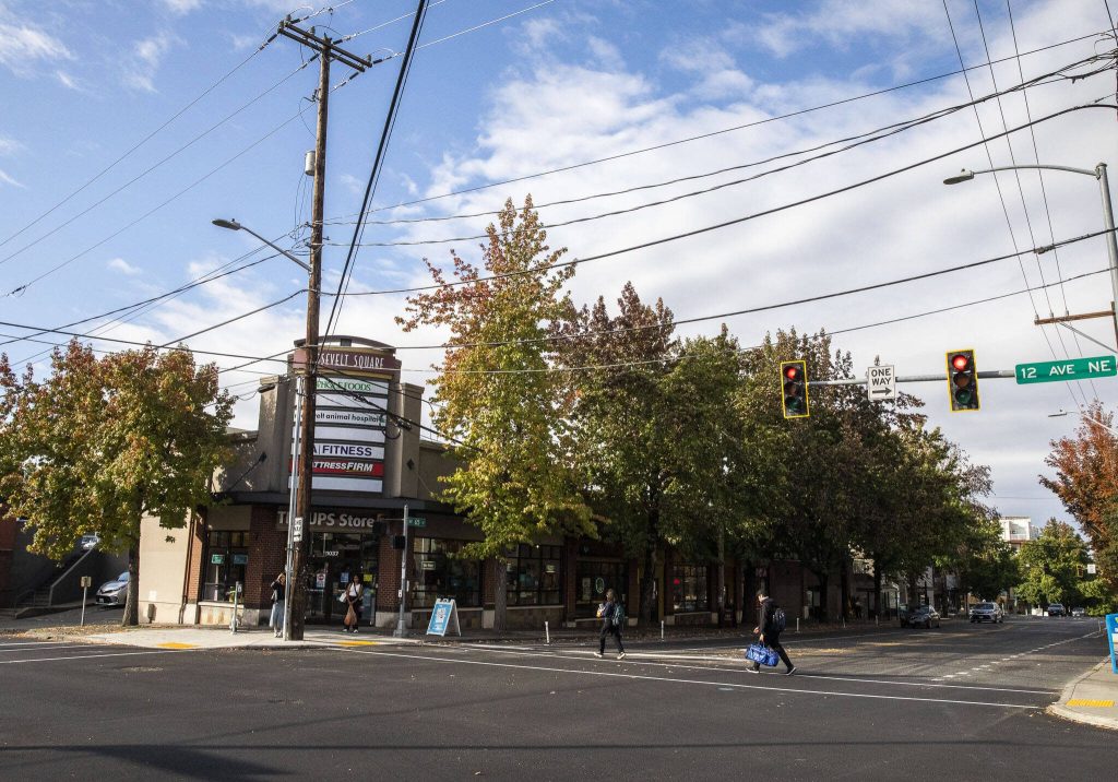 People cross NE 65th Street on Oct. 14, 2024 in Seattle, Washington. (Olivia Vanni / The Herald)