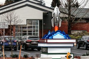 The Evergreen Branch of the Everett Public Library is open and ready for blast off. Dillon Works, of Mukilteo, designed this eye-catching sculpture that greets people along Evergreen Way.   (Dan Bates / The Herald)