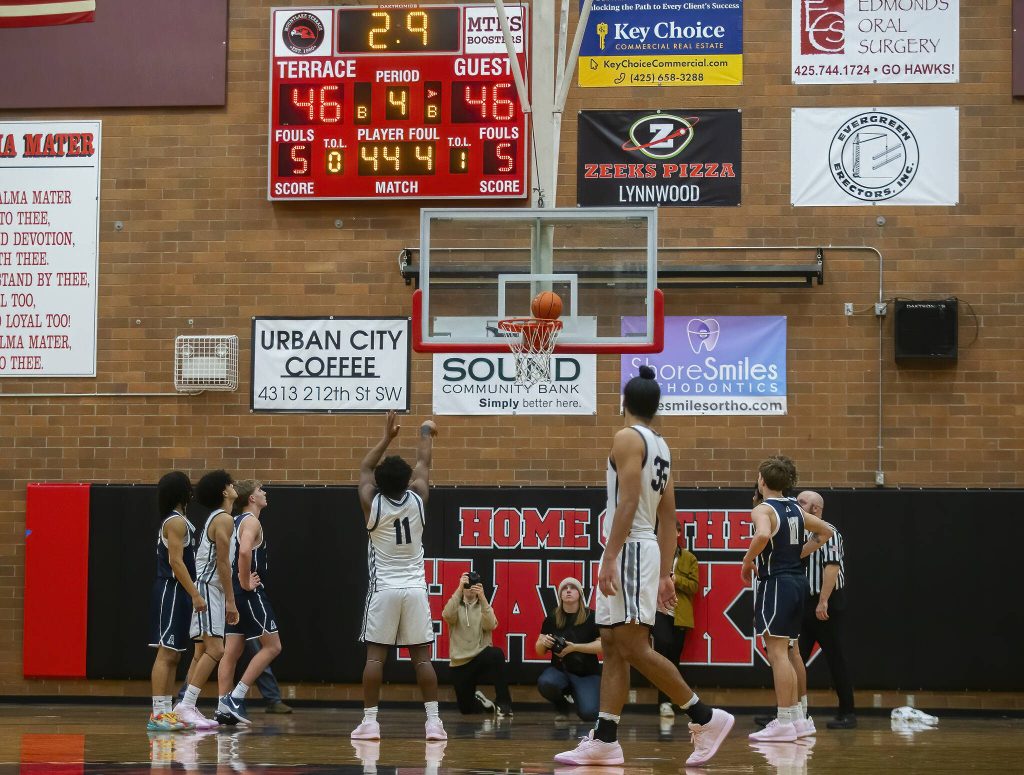 Mountlake Terraces Rayshaun Connor makes a free-throw to pull ahead of Arlington in the final seconds for the win on Tuesday, Dec. 10, 2024 in Mountlake Terrace, Washington. (Olivia Vanni / The Herald)