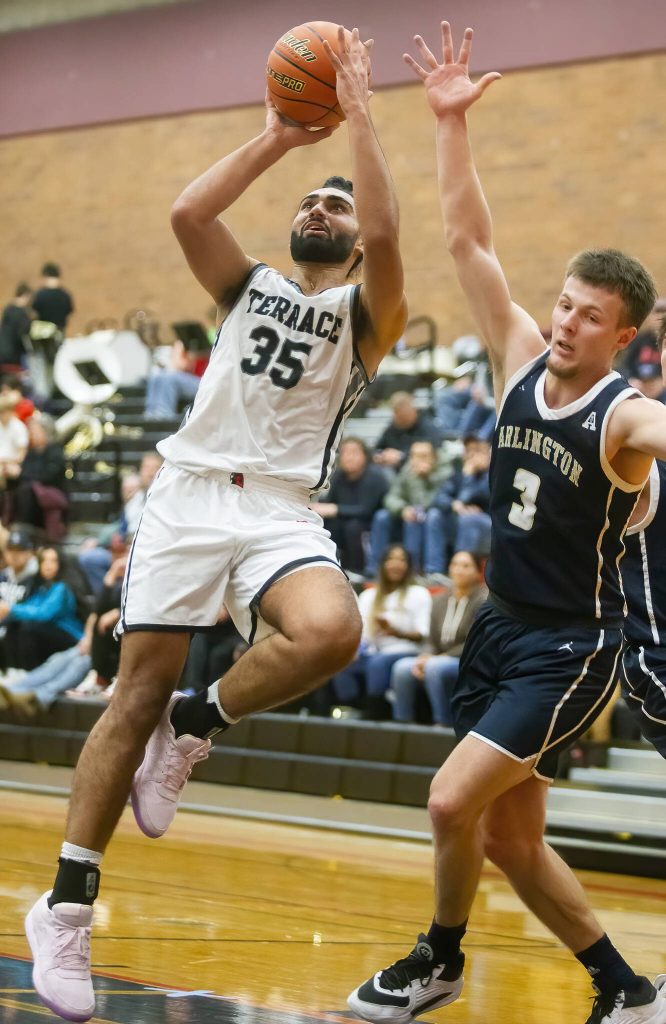 Mountlake Terraces Svayjeet Singh makes a jump shot during the game against Arlington on Tuesday, Dec. 10, 2024 in Mountlake Terrace, Washington. (Olivia Vanni / The Herald)