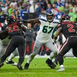 Seahawks left tackle Charles Cross (67) and his fellow offensive linemen block against the Arizona Cardinals at State Farm Stadium on Sunday, Dec. 8, 2024 (Photo courtesy of Edwin Hooper / Seattle Seahawks)