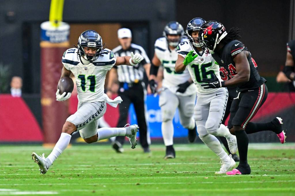 Seahawks receiver Jaxon Smith-Njigba (11) runs after a catch against the Arizona Cardinals at State Farm Stadium on Sunday, Dec. 8, 2024. (Photo courtesy of the Seattle Seahawks)