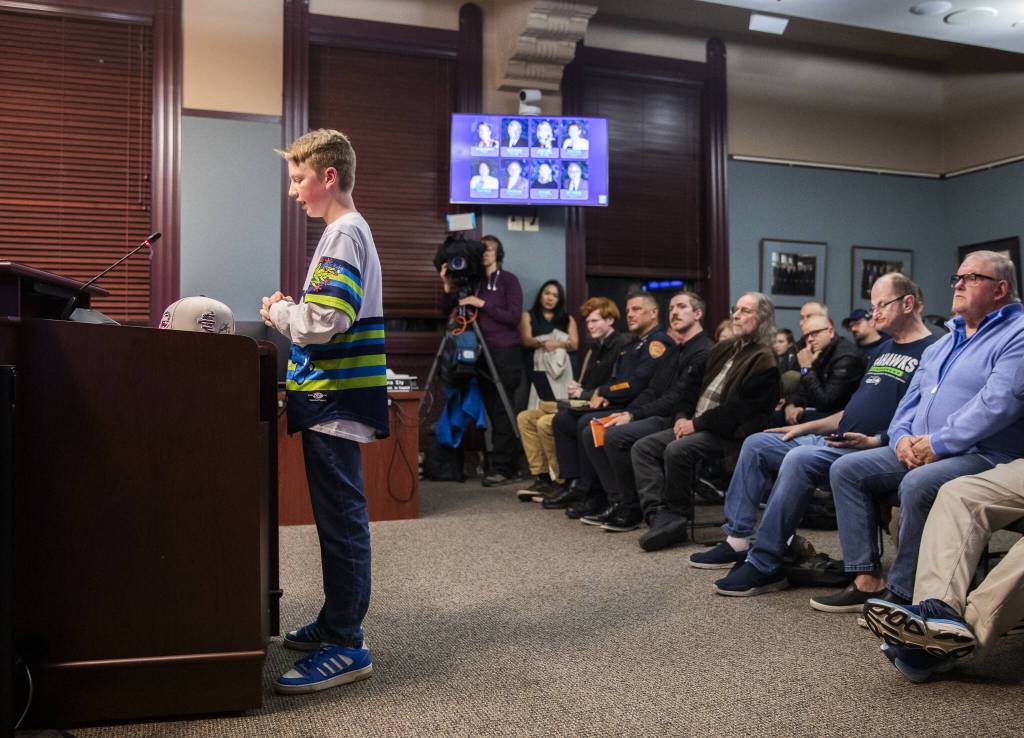 Rhys Stenhouse, 13, speaks to the Everett City Council and encourages members to build a new stadium by quoting Field of Dreams during public comment before a vote on the stadium site location on Wednesday, Dec. 18, 2024, in Everett, Washington. (Olivia Vanni / The Herald)