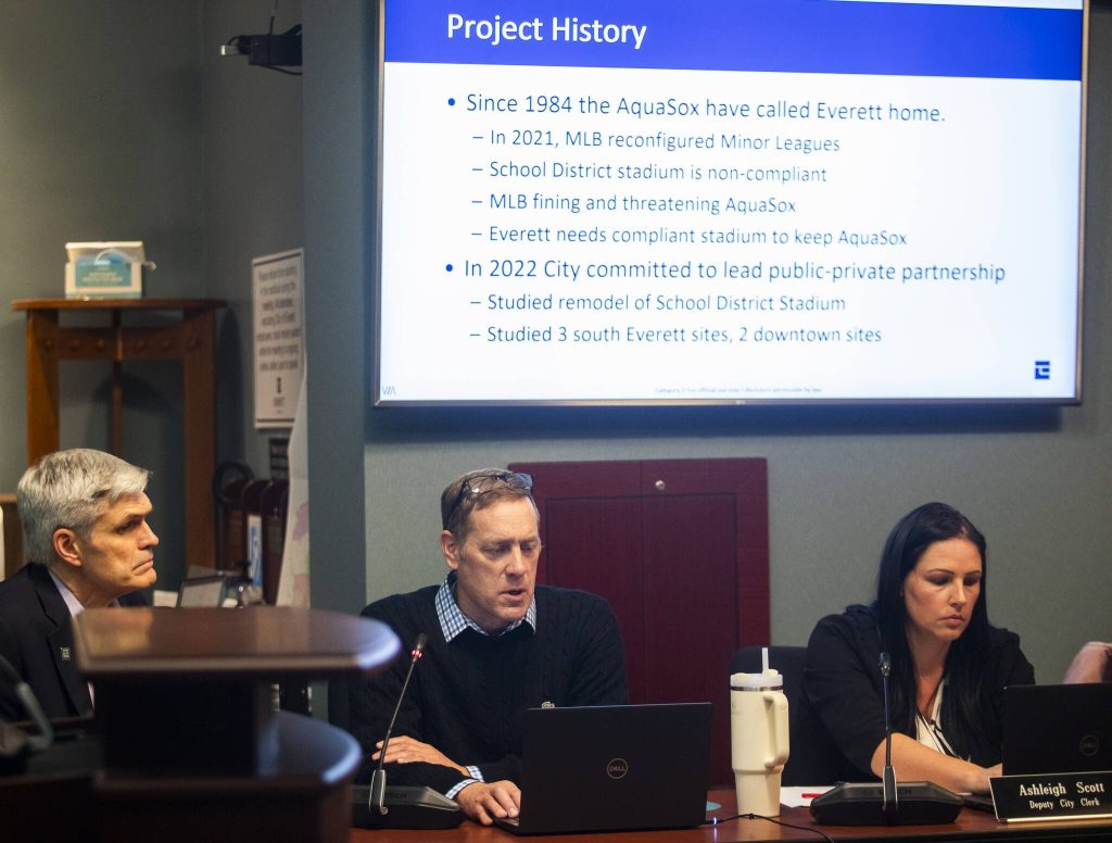 Ben Franz highlights information on the stadium project during a presentation on Wednesday, Dec. 18, 2024, in Everett, Washington. (Olivia Vanni / The Herald)